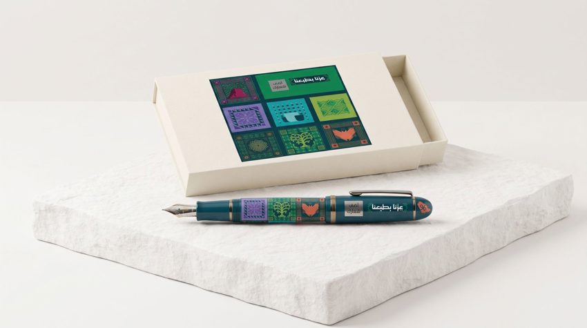 Custom branded pen with company logo for corporate gifting — Admark, Saudi Arabia Printed promotional pens for events and nat