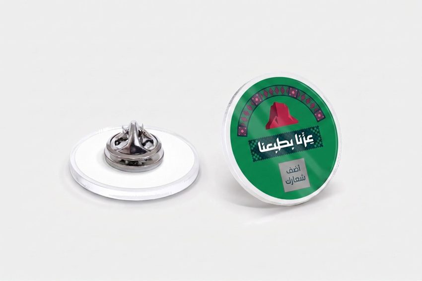 Custom enamel lapel pin with company logo for corporate events — Admark, Saudi Arabia Custom staff name badges and button bad